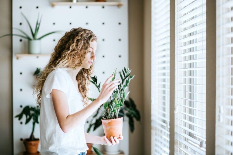 Woman with her Indoor Plants