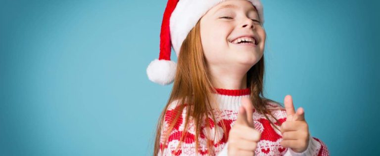 Santa's Little Helper Smiling and Pointing Fingers, With Copy Space