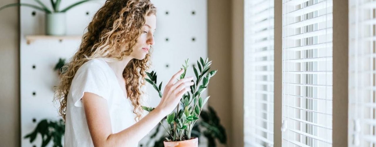 Woman with her Indoor Plants